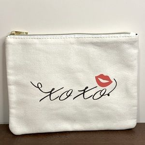XOXO white canvas cosmetic bag